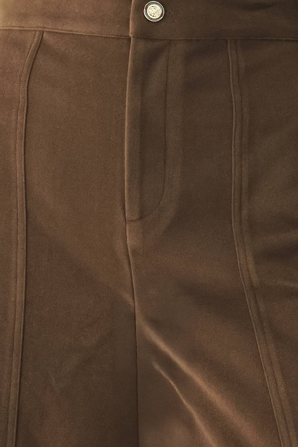 A model wearing high-waisted, wide-leg brown trousers with a corduroy-like texture | FREEMARKET