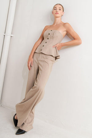 A solid knit pant with front closure and wide leg