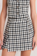 MONA CHECK TWEED SKORT.