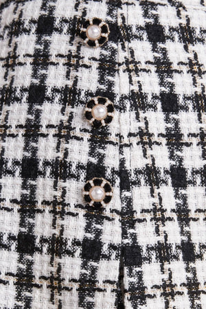 MONA CHECK TWEED SKORT.