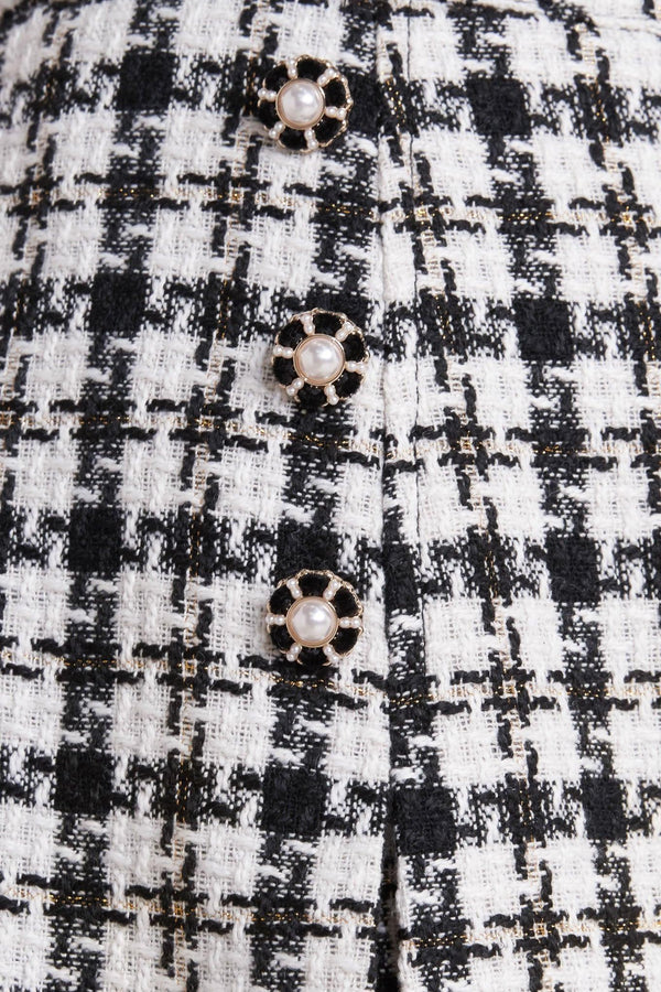 MONA CHECK TWEED SKORT.