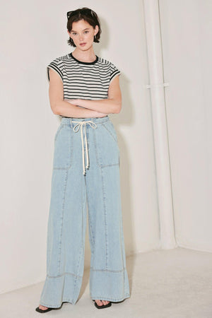 WEEKEND SOUNDTRACK DENIM PANTS.