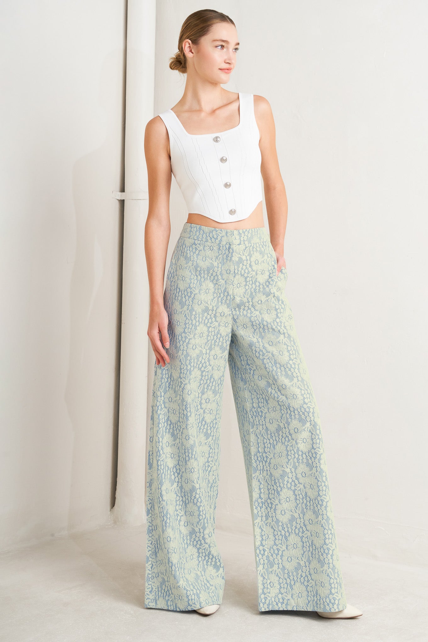 A woven bonded lace pant featuring side zipper closure and wide leg. 

Details: 

Self: 50% Rayon 50% Polyester

Size & Fit

-Model is 5`8" And Wearing Size Small
-Measurements Taken From Size Small
-Approx. Length: 44"