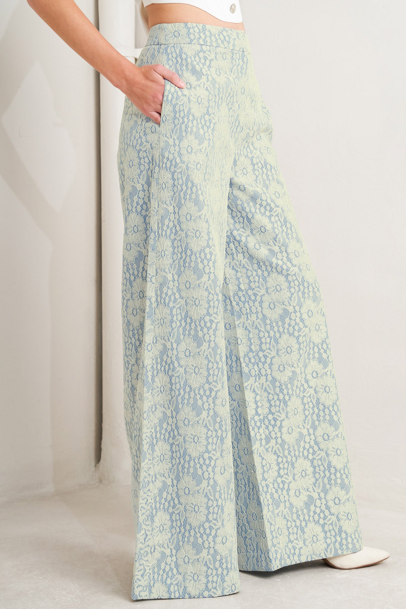 A woven bonded lace pant featuring side zipper closure and wide leg. 

Details: 

Self: 50% Rayon 50% Polyester

Size & Fit

-Model is 5`8" And Wearing Size Small
-Measurements Taken From Size Small
-Approx. Length: 44"