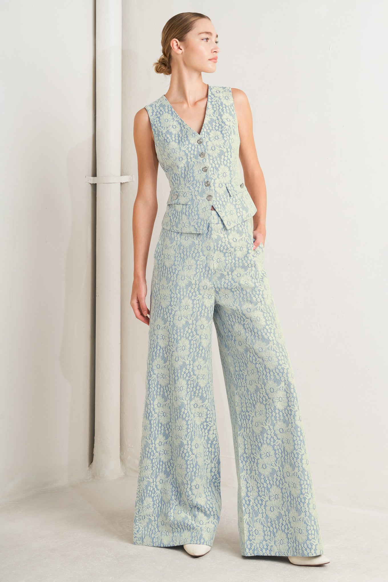 A woven bonded lace pant featuring side zipper closure and wide leg. 

Details: 

Self: 50% Rayon 50% Polyester

Size & Fit

-Model is 5`8" And Wearing Size Small
-Measurements Taken From Size Small
-Approx. Length: 44"