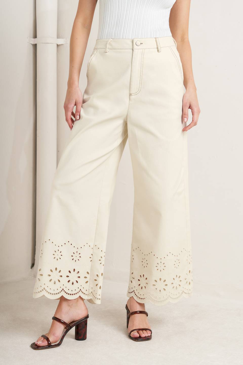 Beige pants with lace detailing worn by a person on a plain background - SET - FLYING TOMATO