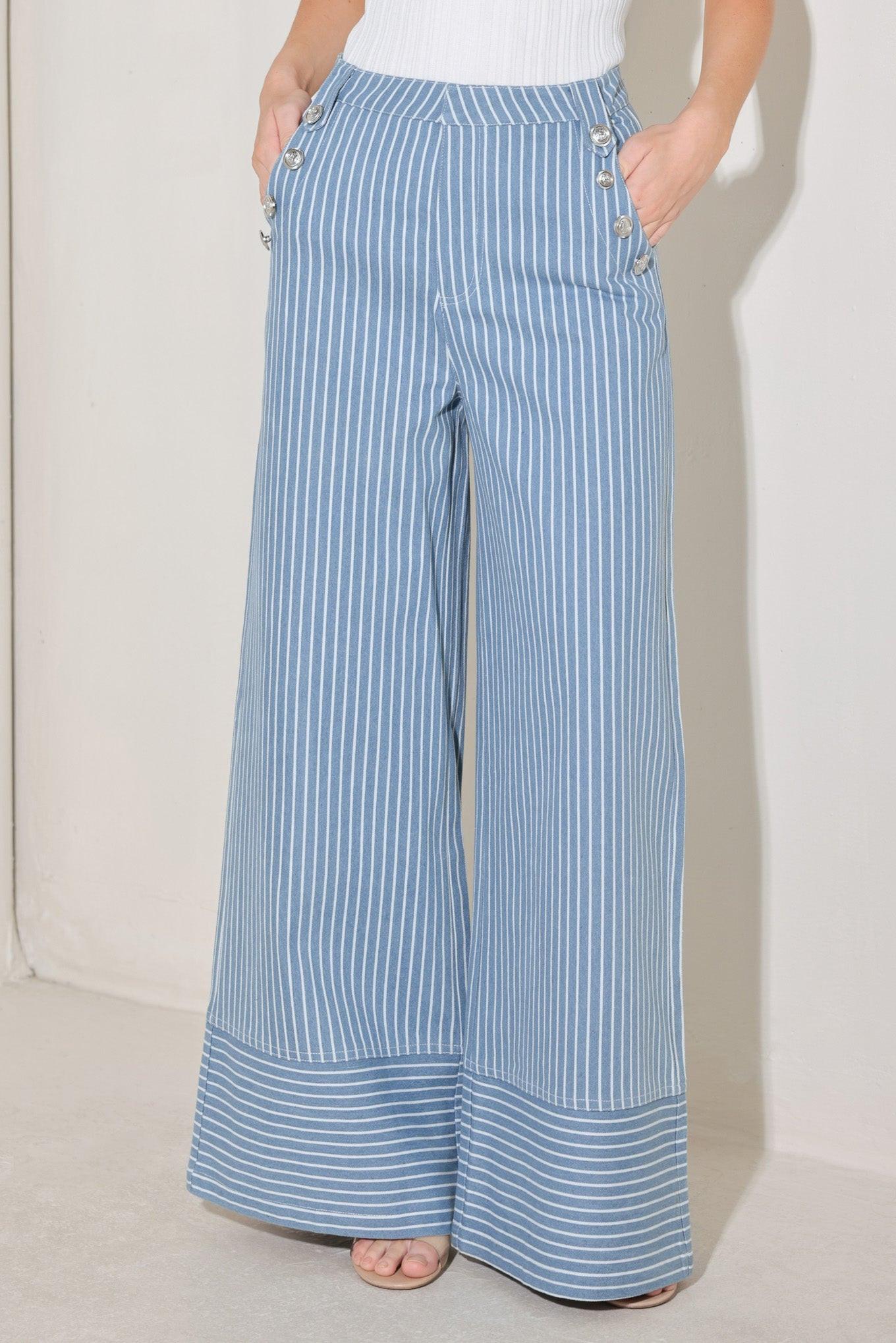 
A striped woven pant featuring front closure, side pockets with buttons and wide leg. Matching vest FJ1360B

Details:

Self : 80% Cotton 20% Polyester

Size &amp; Fit

- Model is 5`8" And Wearing Size Small
- Measurements Taken From Size Small
- Approx. Length: 44"
