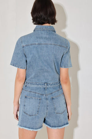 
A washed denim romper featuring collar, button down, short sleeve pockets and self tie

Details:

Self : 90% Cotton 10% Polyester

Size &amp; Fit

- Model is 5`8" And Wearing Size Small
- Measurements Taken From Size Small
- Approx. Length: 33"