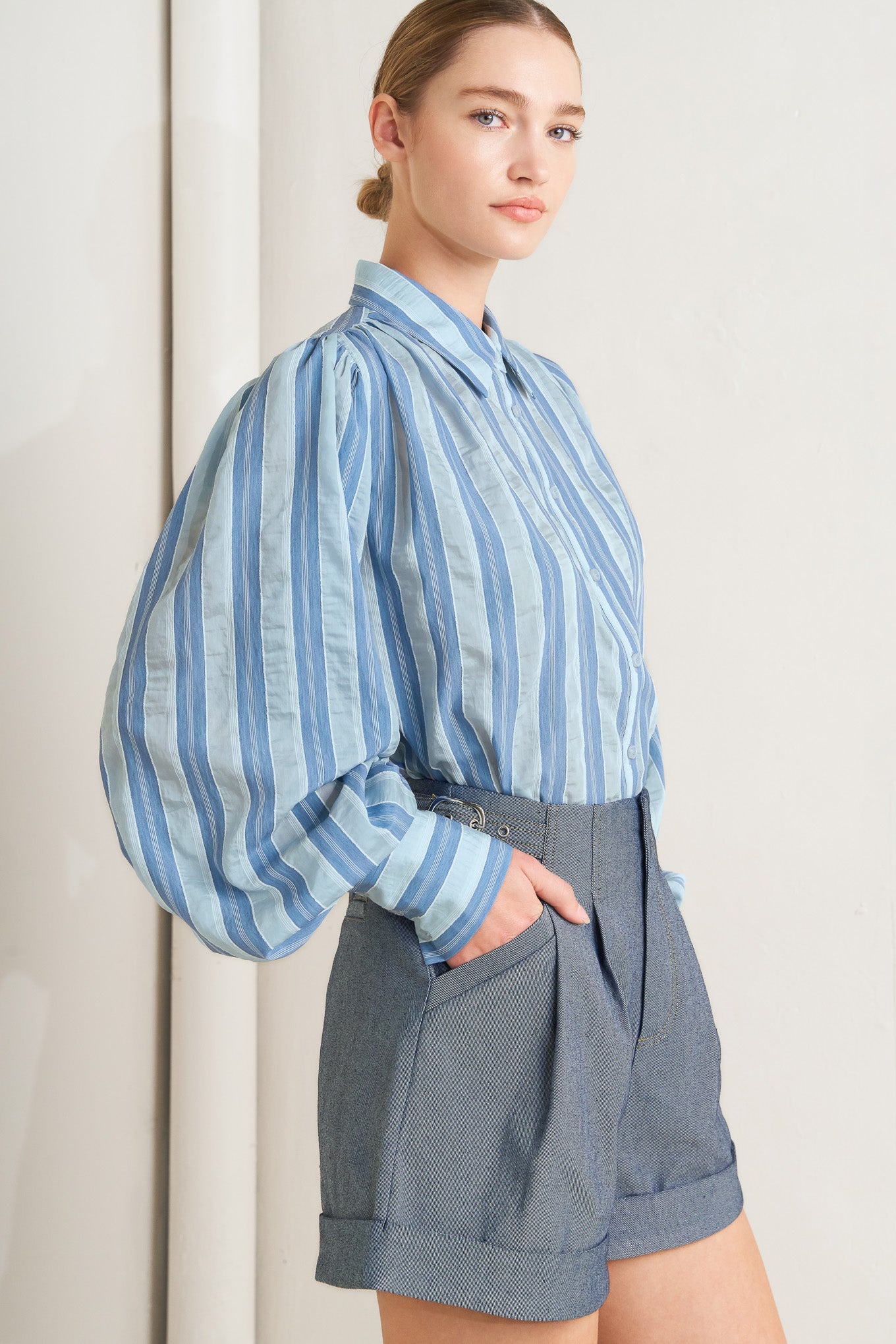 A woven short featuring side tab, front closure, pockets and cuffed hem

Details:

Self : 90% Cotton 10% Polyester

Size & Fit

- Model is 5`8" And Wearing Size Small
- Measurements Taken From Size Small
- Approx. Length: 16"