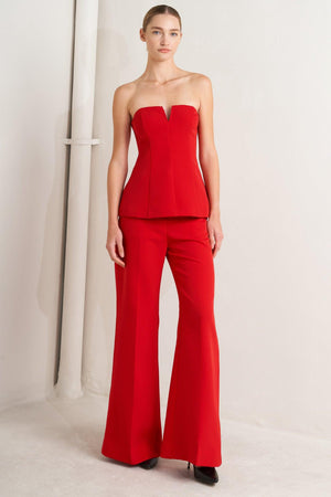 A solid woven pant with front closure and side pockets. Matching top FT1762-B

Details:

Self: 95% Polyester 5% Spandex

Lining: 100% Polyester

Size & Fit

-Model is 5`8" And Wearing Size Small
-Measurements Taken From Size Small
-Approx. Length: 43"