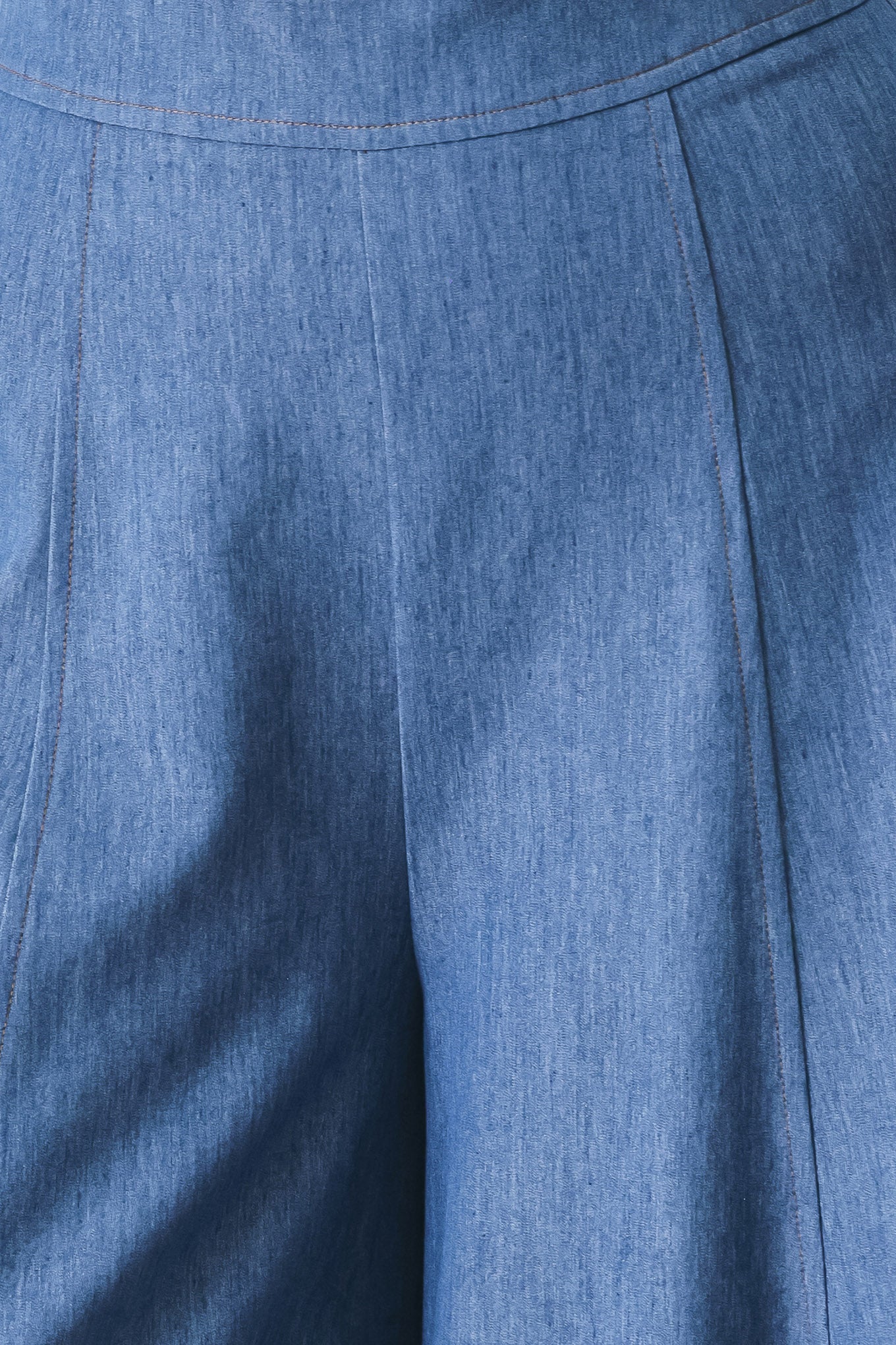 Close up of blue wide leg woven pants with back zipper closure | FREEMARKET
