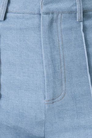 Close up of light blue pants with front closure | FREEMARKET | Flying Tomato