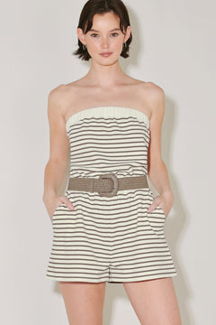 Woman wearing a strapless striped knit romper featuring strapless with elastic opening, elastic waist, side pocket and contrasting belt | FREEMARKET | Flying Tomato