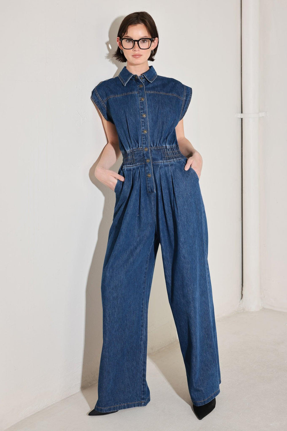 POWER PLAY DENIM JUMPSUIT.
