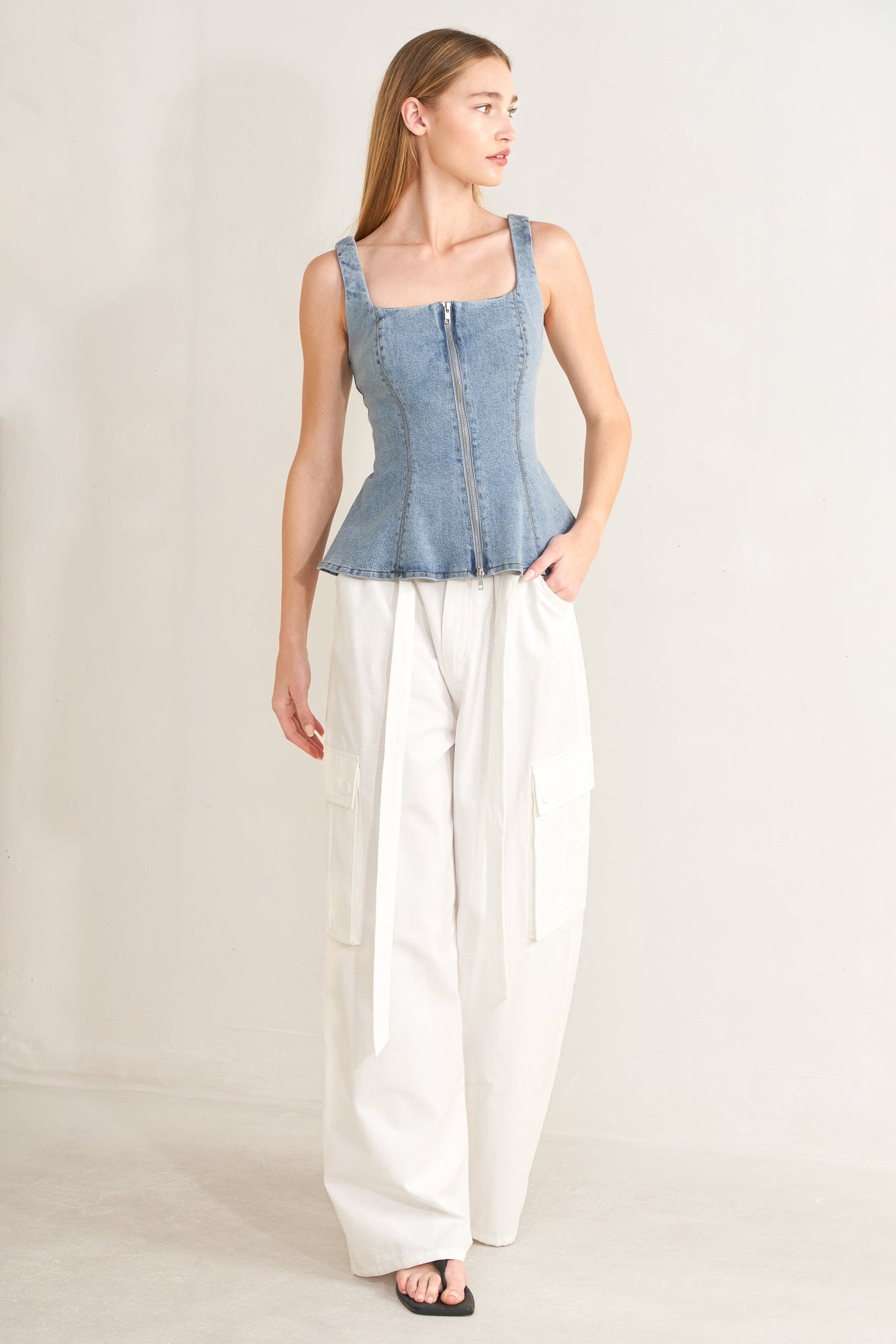 Woman wearing white wide-leg cargo pants with sash tie | FREEMARKET | Flying Tomato