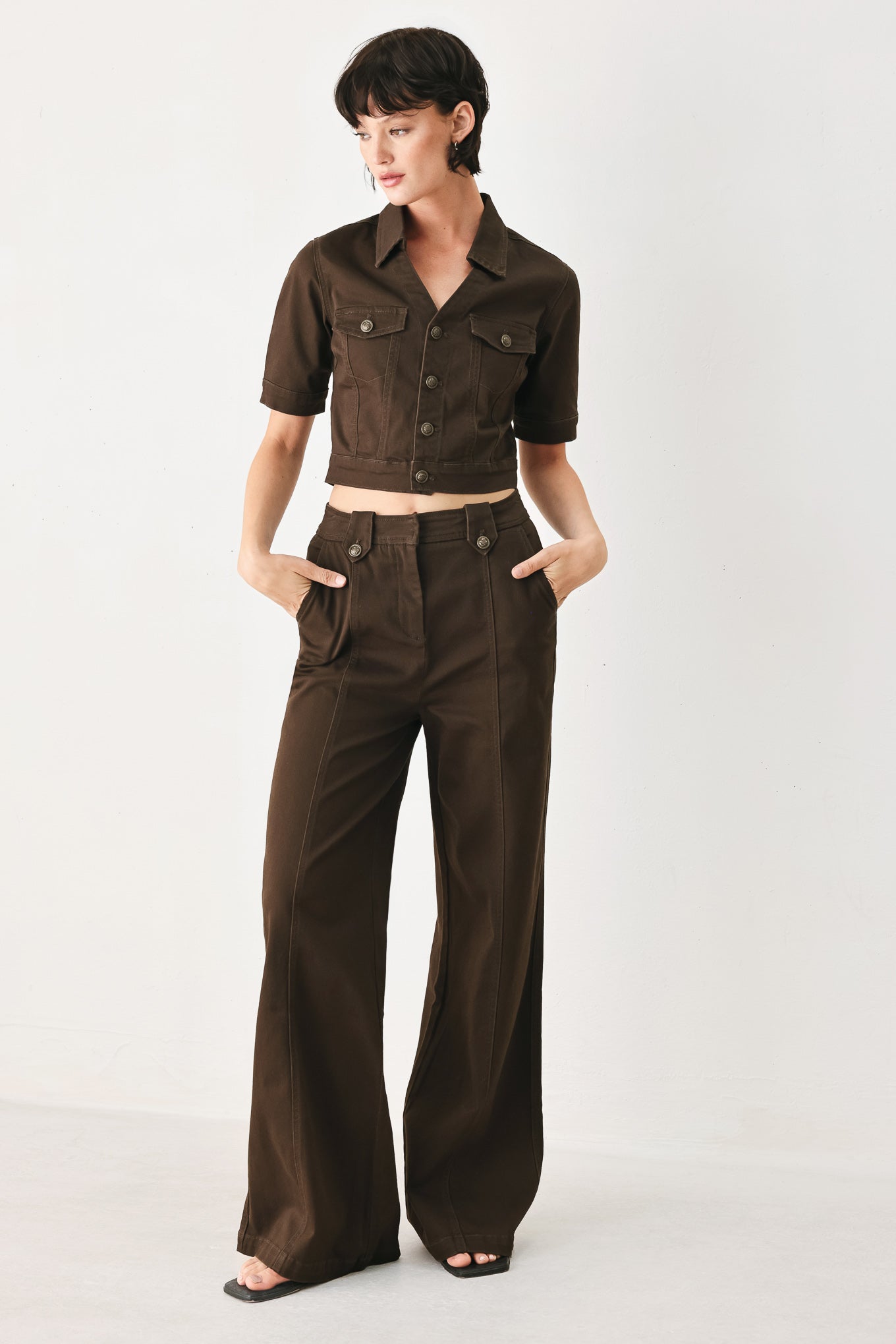 Woman wearing brown wide-leg pants | FREEMARKET