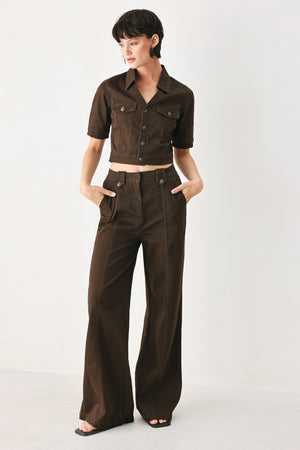Woman wearing brown wide-leg pants | FREEMARKET