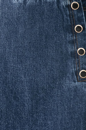 Close up of denim skort with button detail and back zipper closure | FREEMARKET