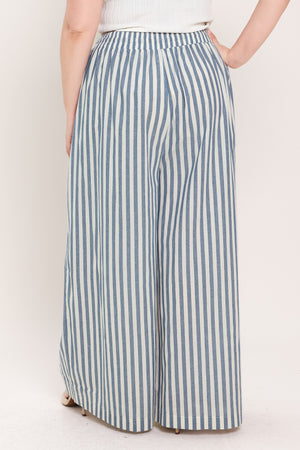 Woman wearing striped woven pant featuring front pleat, side pockets, wide leg and elastic back waistband | FREEMARKET