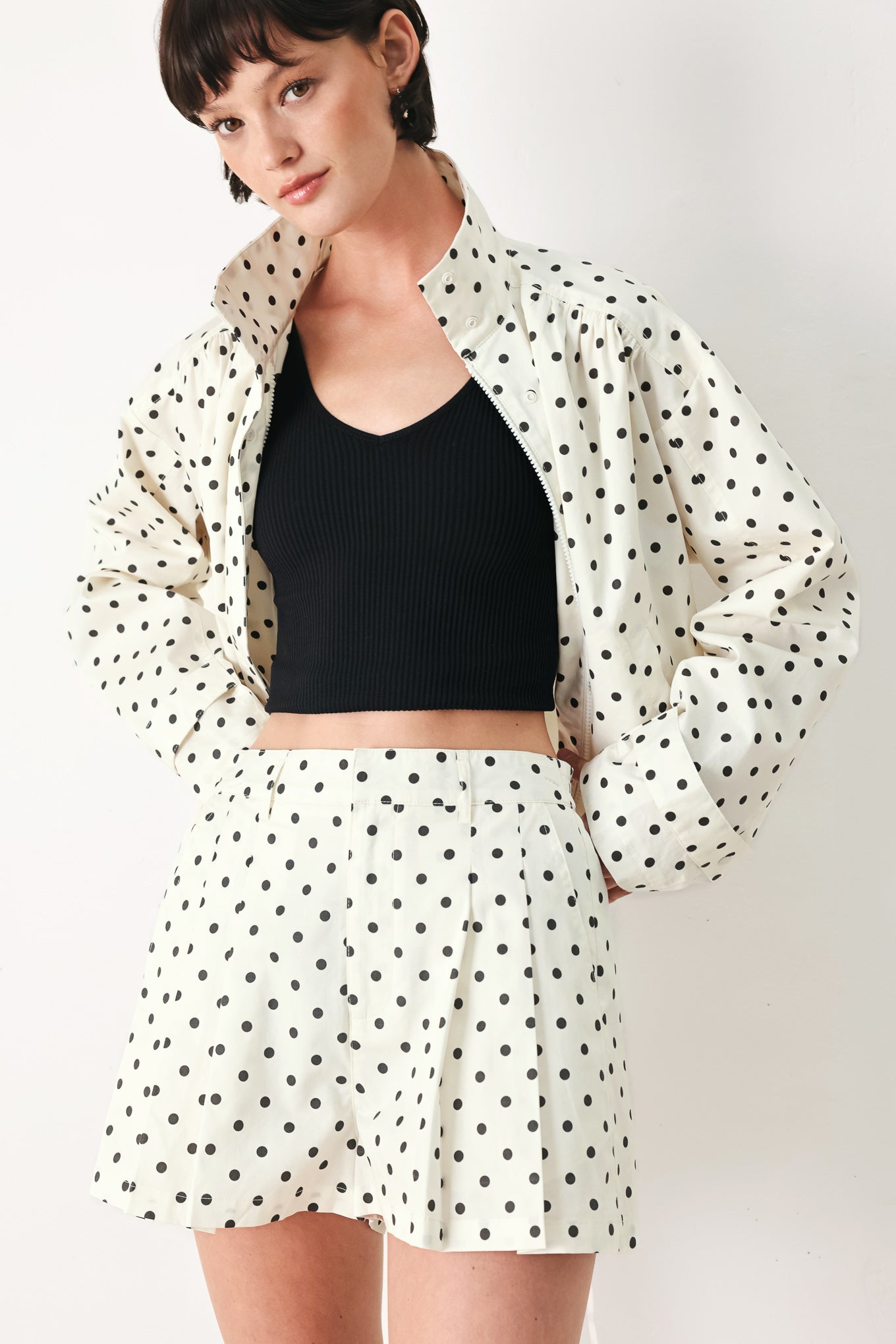 Woman wearing  polka dot shorts with front closure and side pockets | FREEMARKET