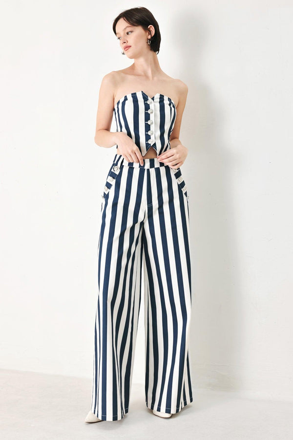 NAVY BLOSSOM WOVEN PANTS.