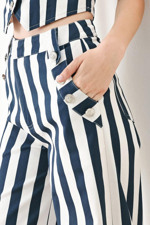 NAVY BLOSSOM WOVEN PANTS.