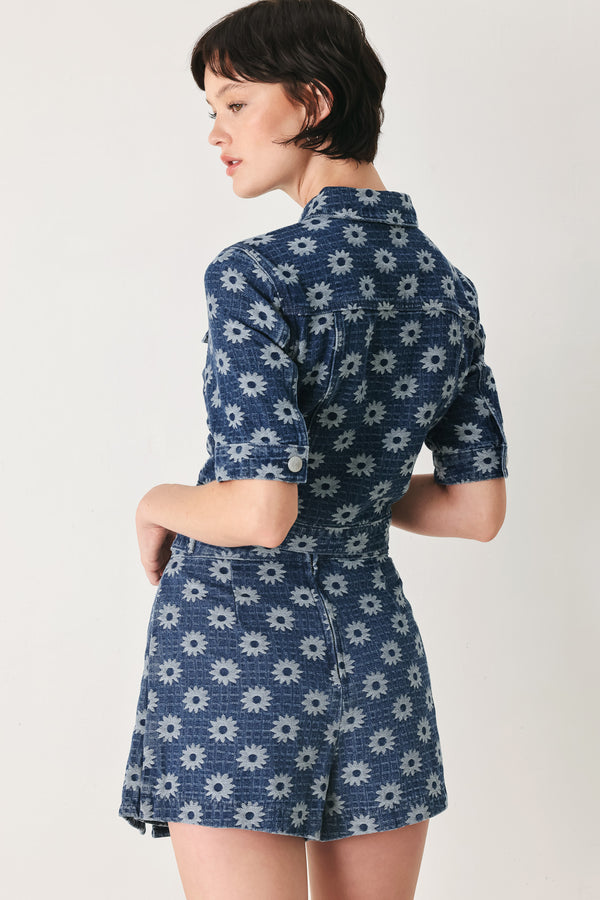 Woman wearing a jacquard blue denim skort with side tab front side slit and back zipper closure | FREEMARKET