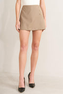 MANHATTAN PEPLUM WOVEN SKORT.