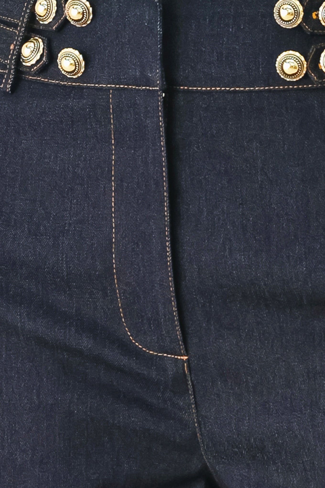 Woman wearing dark denim navy blue wide-leg pants with gold buttons | FREEMARKET