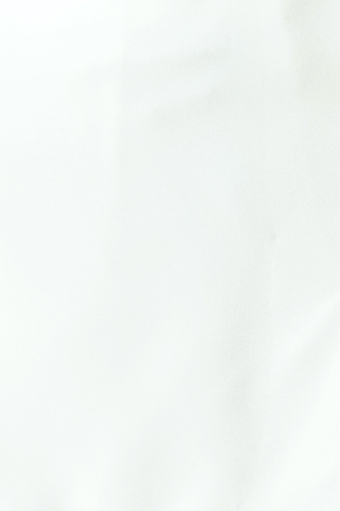 Woman wearing a white skort with side zipper closure | FREEMARKET