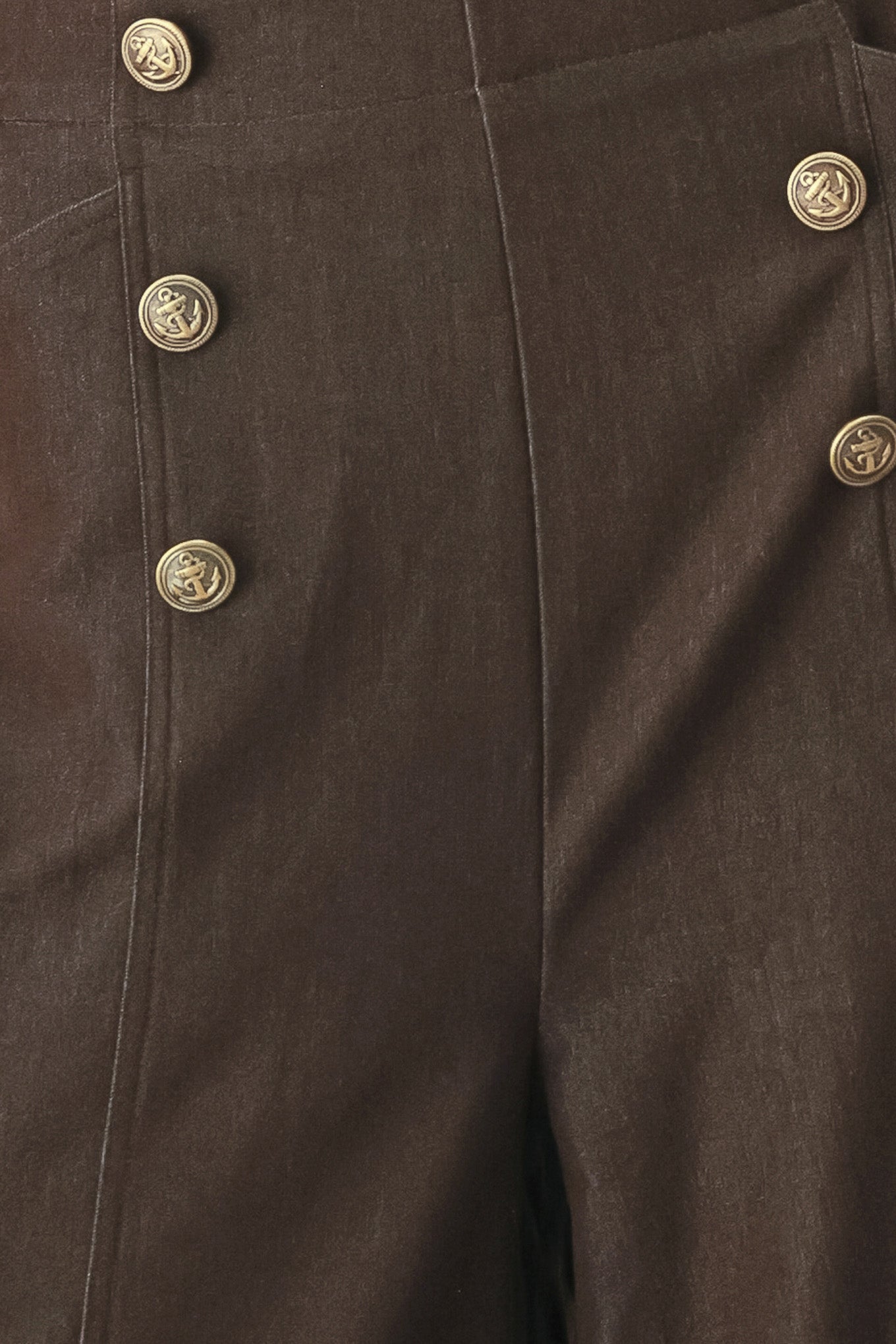 Woman wearing brown solid woven culotte pant with front button detail and back zipper closure | FREEMARKET