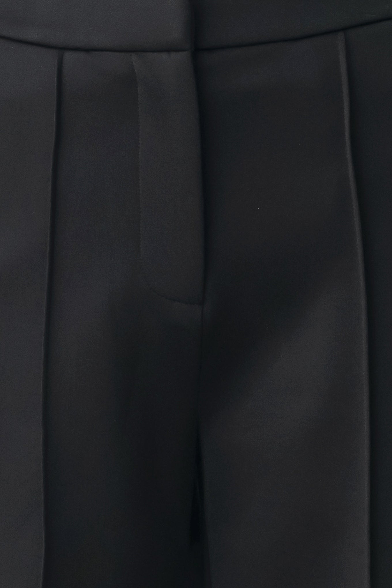 Model wearing black wide-leg trousers with white side stripes | FREEMARKET