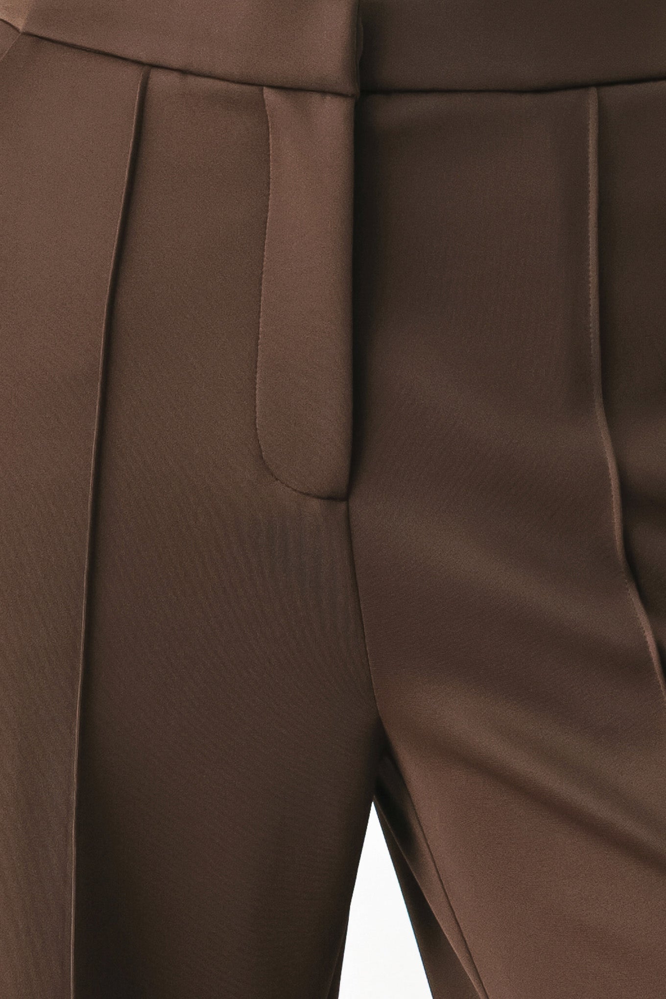 Model wearing brown wide-leg trousers with white side stripes | FREEMARKET