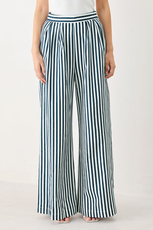 Woman wearing blue and white striped wide-leg pants | FREEMARKET