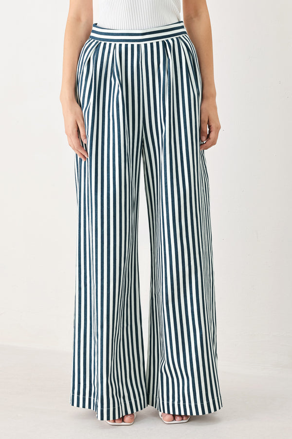 Woman wearing blue and white striped wide-leg pants | FREEMARKET