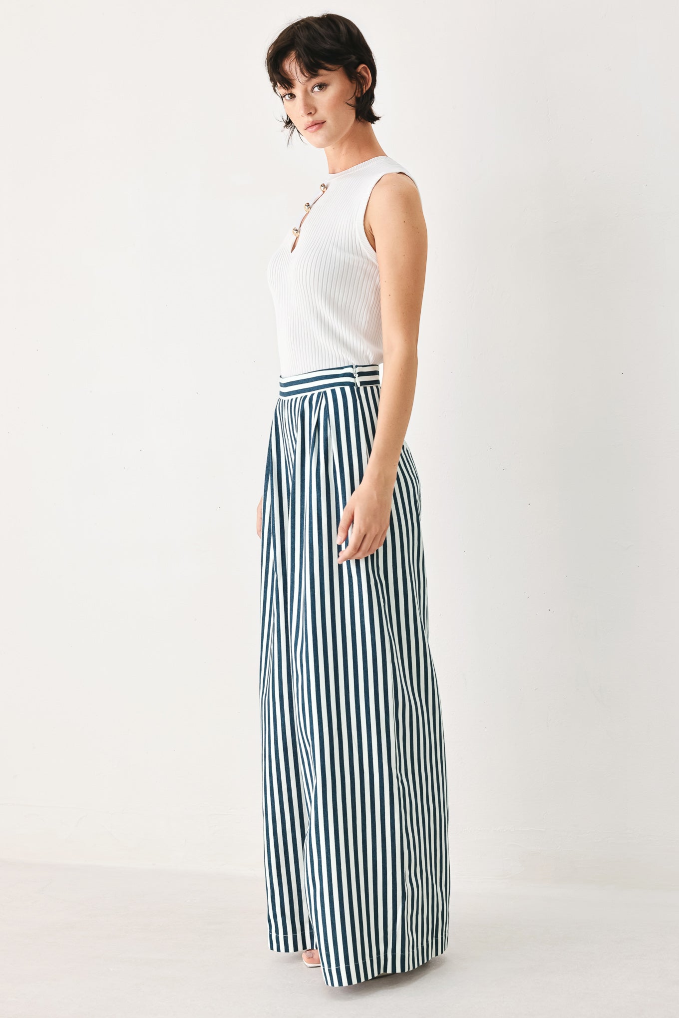 Woman wearing blue and white striped wide-leg pants | FREEMARKET
