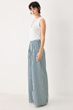 Woman wearing blue and white striped wide-leg pants | FREEMARKET