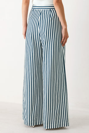 Woman wearing blue and white striped wide-leg pants | FREEMARKET