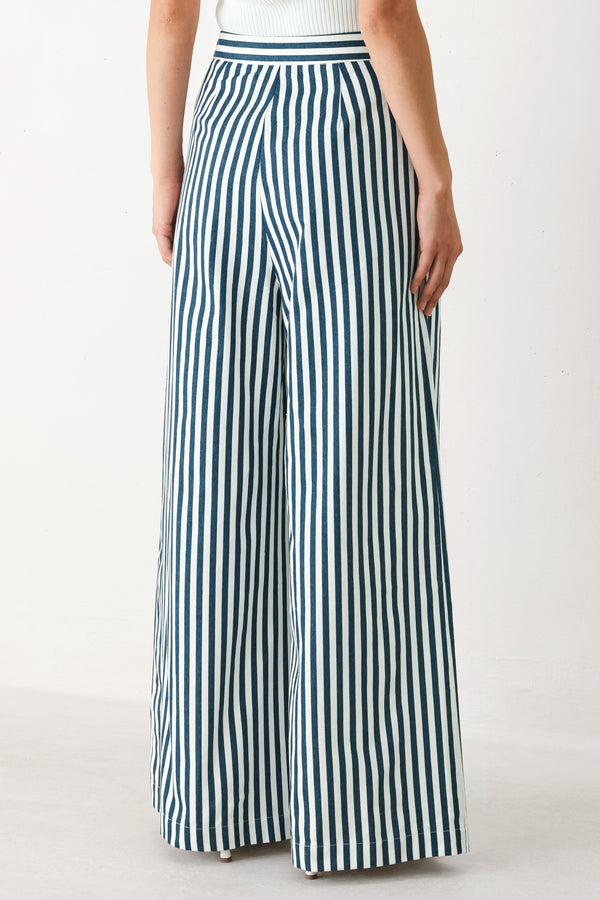 Woman wearing blue and white striped wide-leg pants | FREEMARKET