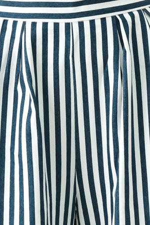 Woman wearing blue and white striped wide-leg pants | FREEMARKET