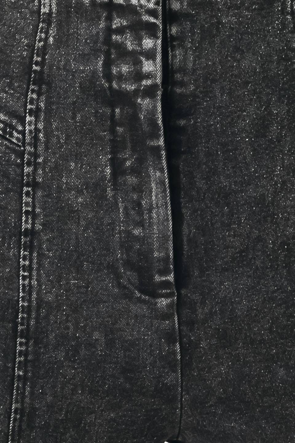 A pair of high-waisted, wide-leg jeans in a washed black or charcoal gray denim, shown on a model | FREEMARKET