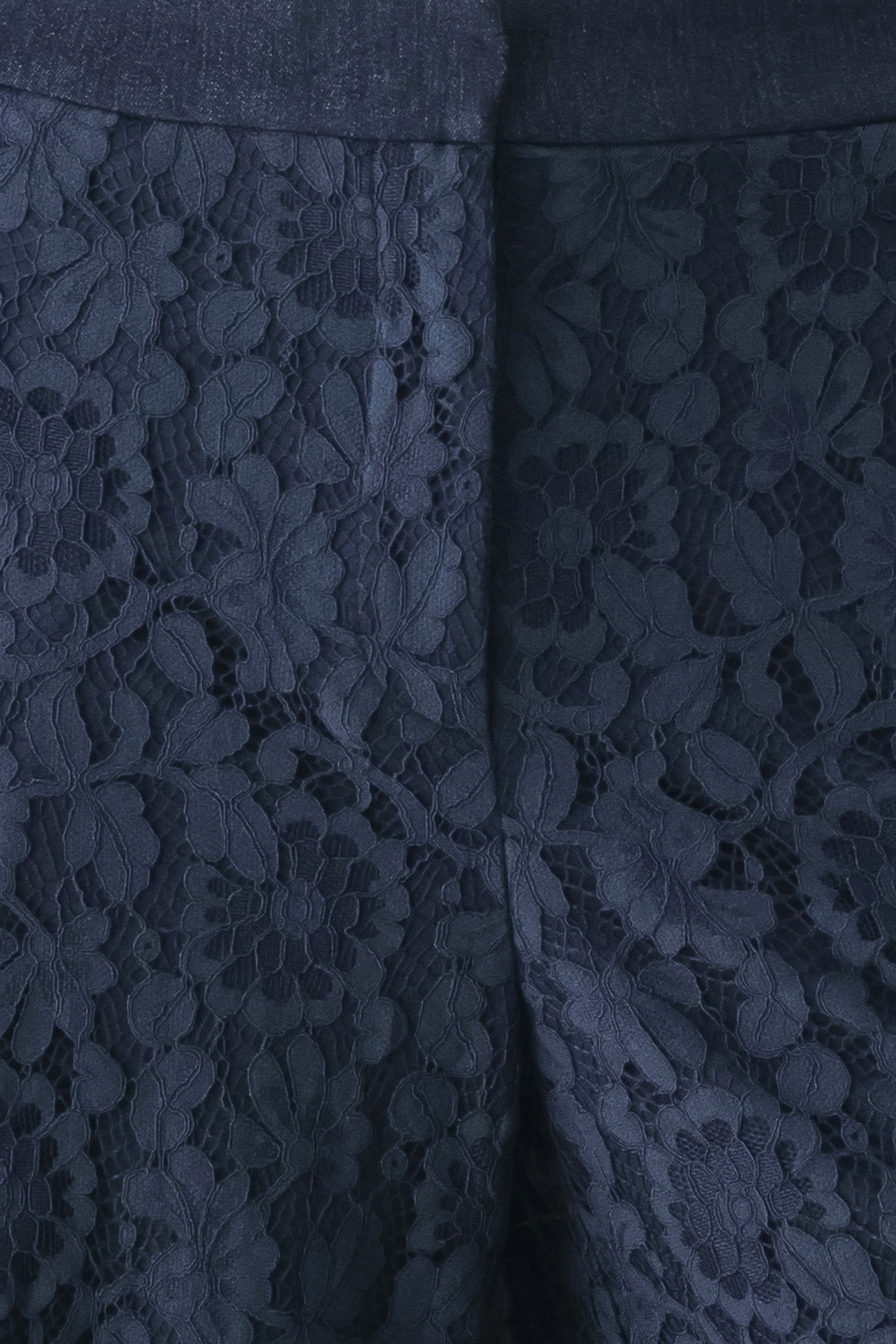 A model wearing dark navy lace wide-leg pants | FREEMARKET