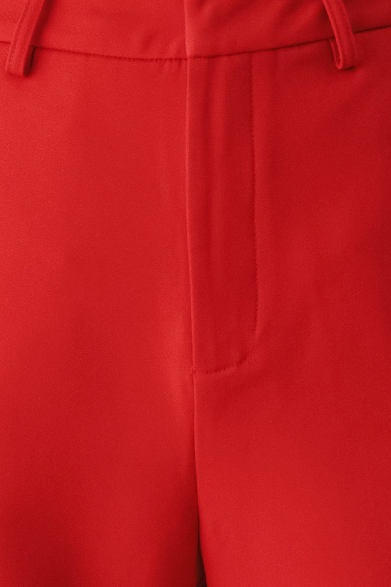 Red wide-leg cropped pants with rolled cuffs, shown on a model | FREEMARKET