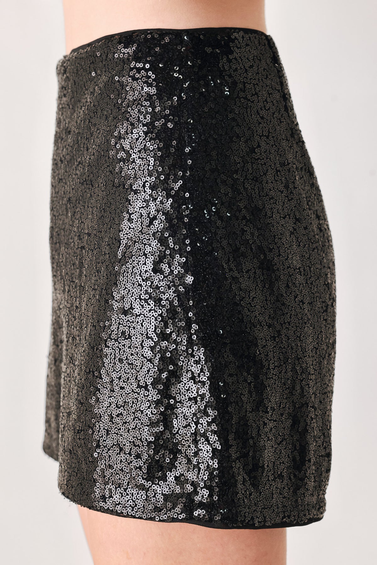 A model from the waist down wearing a black sequined shorts | FREEMARKET