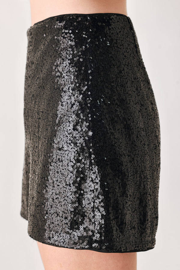 A model from the waist down wearing a black sequined shorts | FREEMARKET