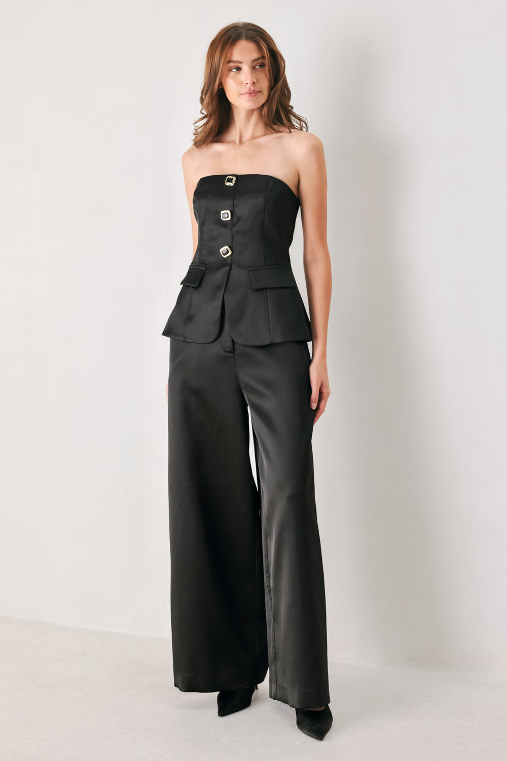 Burgundy wide-leg trousers with a satin-like sheen, shown on a model | FREEMARKET