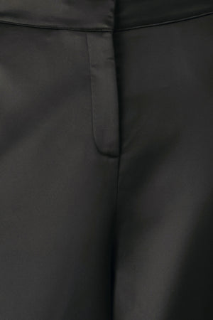 Black wide-leg trousers with a satin-like sheen, shown on a model | FREEMARKET