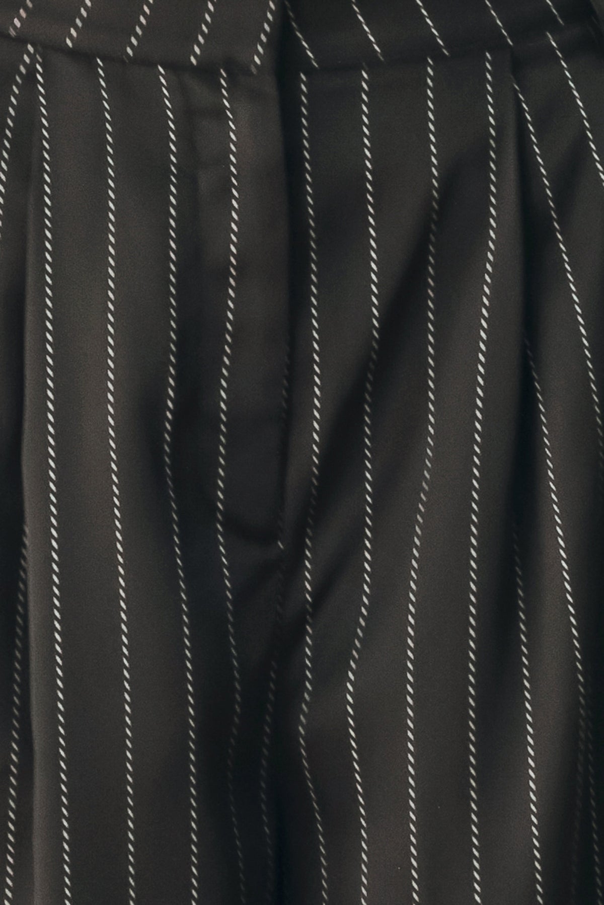 Black wide-leg trousers with thin white vertical pinstripes, shown on a model | FREEMARKET