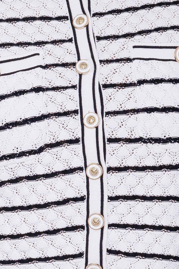 A DAY IN THE MEADOW KNIT CARDIGAN.