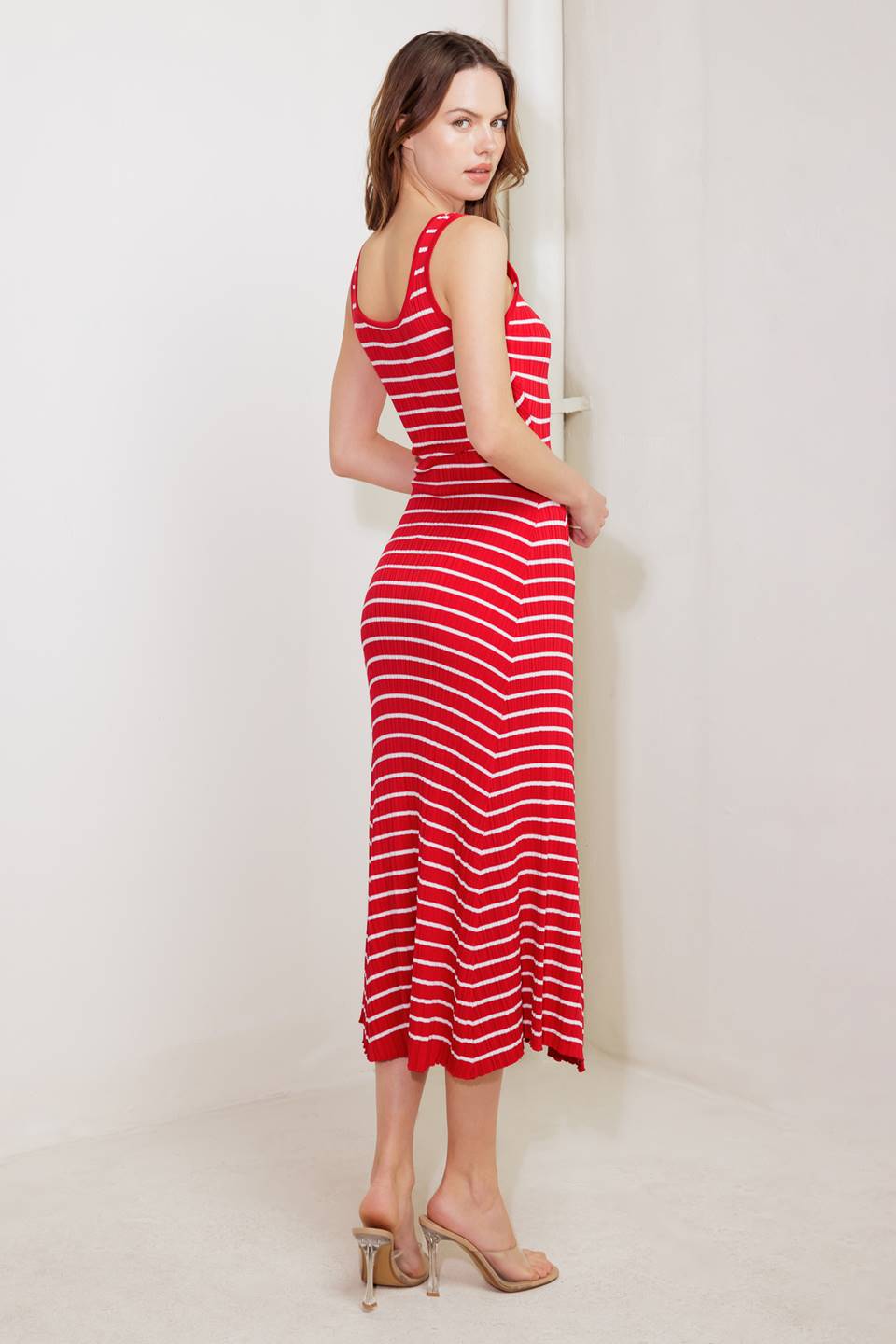 A striped sweater knit midi dress featuring square neckline and sleeveless